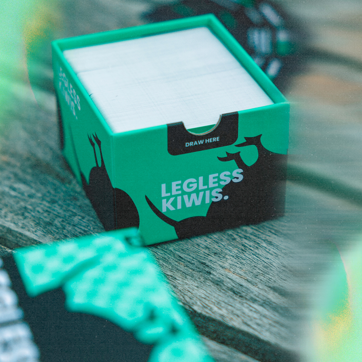 Legless Kiwis, New Zealand Kiwi drinking card game box on a table 300 cards